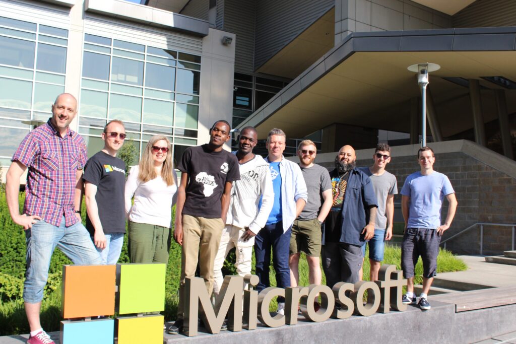 All the winners of our Microsoft Hackathon 2019 contest pose together with the Microsoft sign during the event on our Redmond campus.