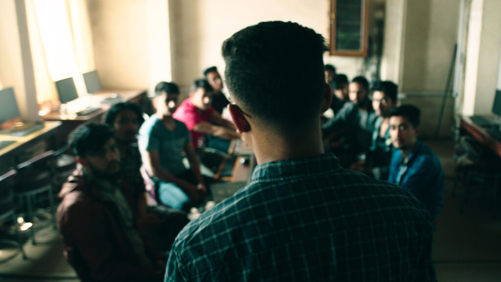 Sambhav leading a group of his classmates in their native language, Nepali.