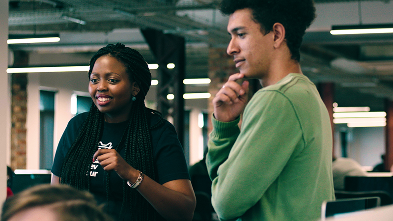 Vuyo working with students at WeThinkCode_.